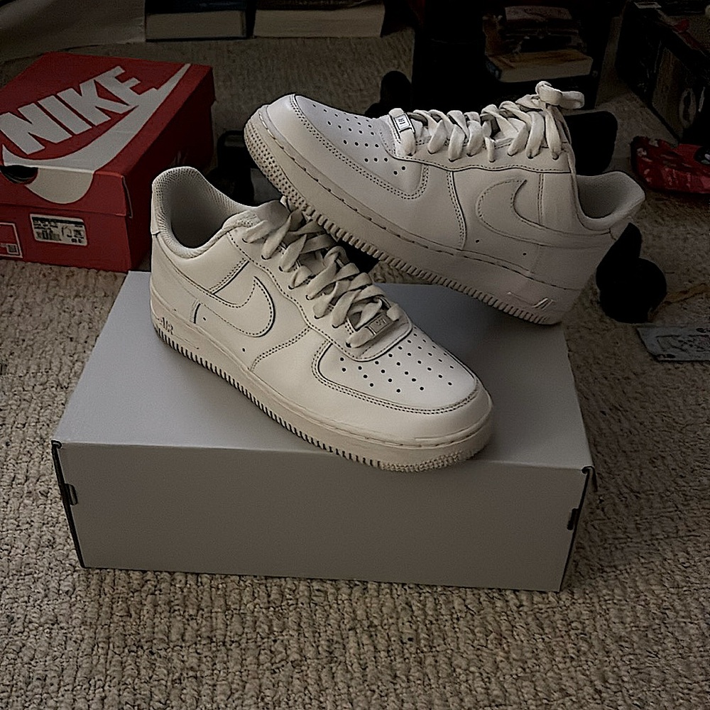 These are White Nike Air Force 1’s. They are a size 8.